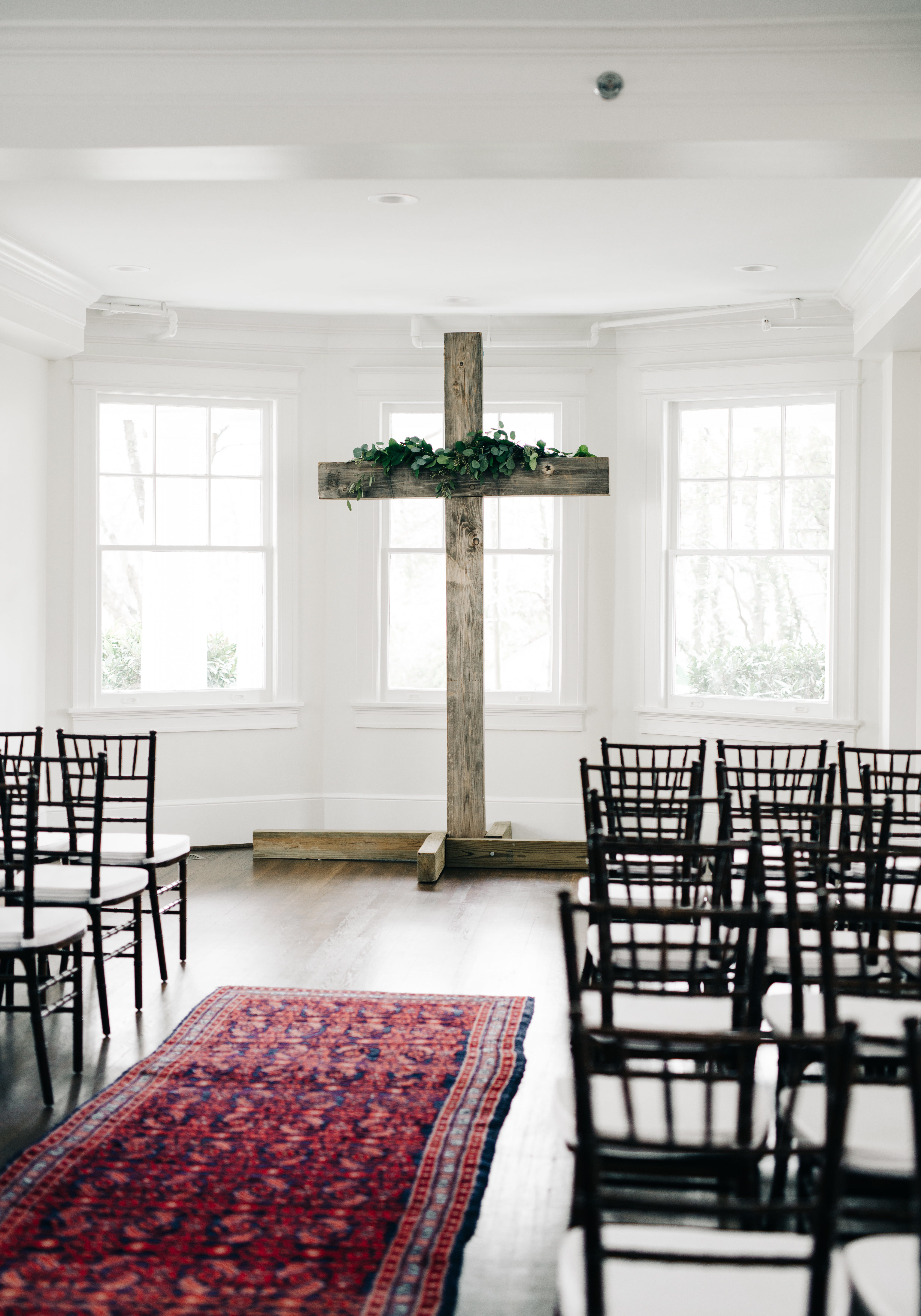 Cross and vintage runner at ceremony at McAlister-Leftwich House | Greensboro, NC