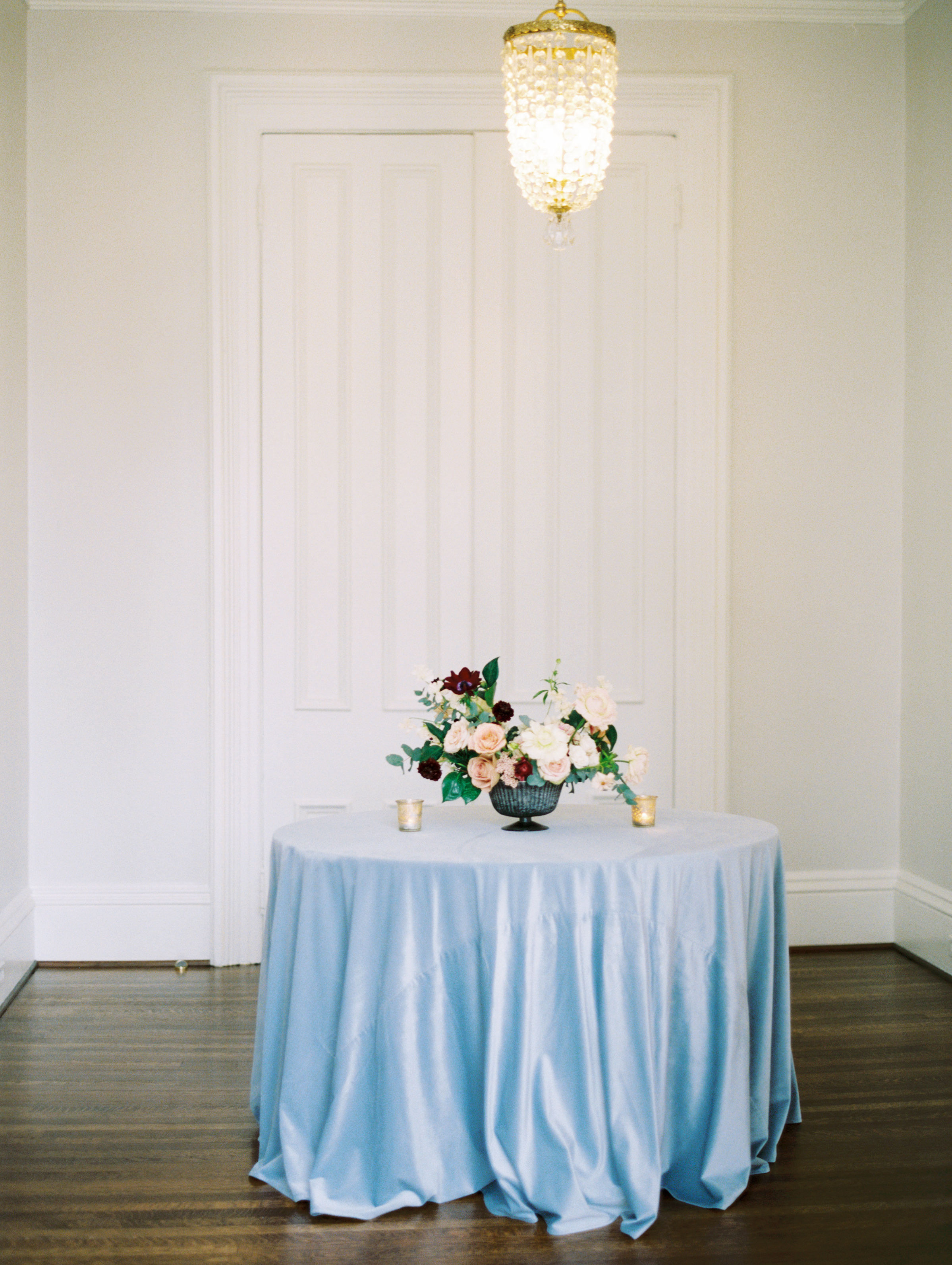 Dusty blue velvet tablecloth at McAlister-Leftwich House in Greensboro, NC, historic wedding and event venue